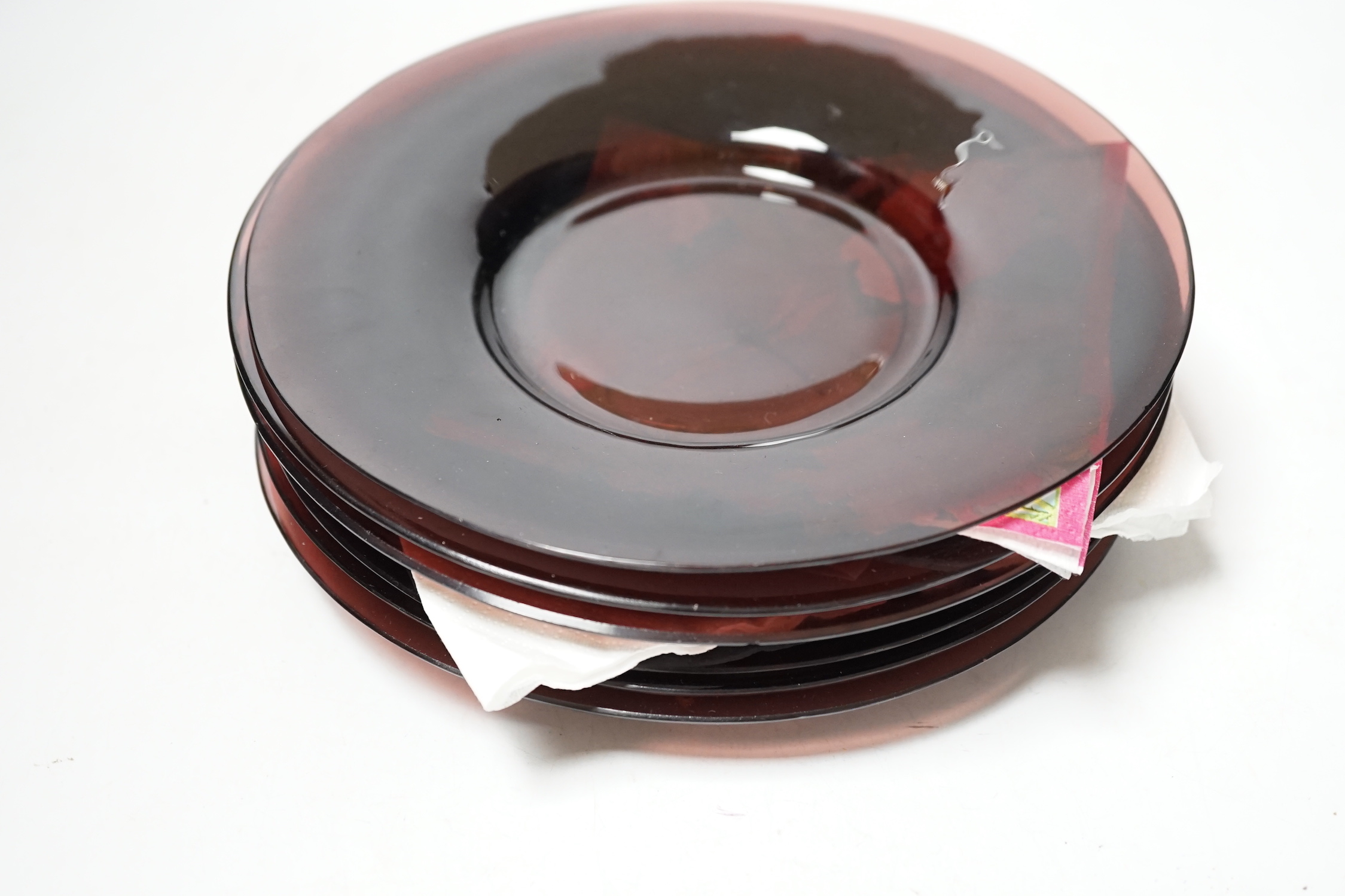 Six 19th century Chinese amethyst glass plates, 19cm diameter